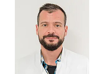 Dr Nicolas Mentine